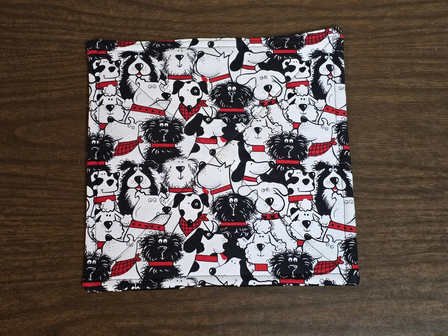 Pot-Holder-black and white dogs with white paw print