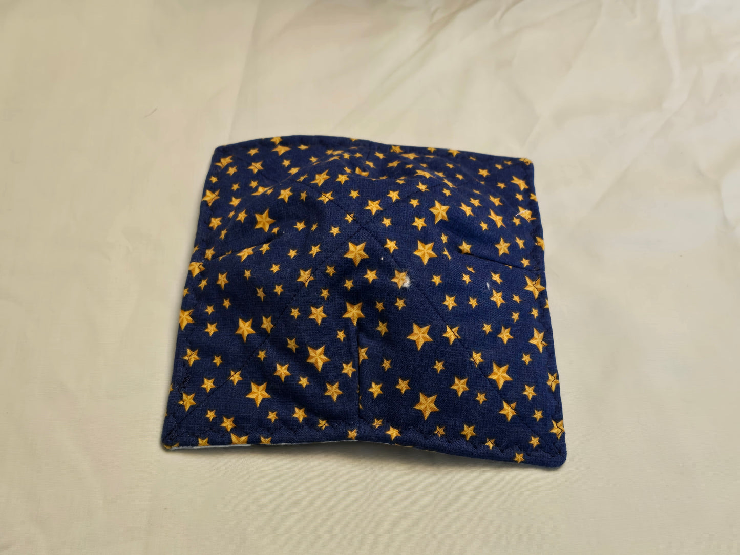 Plate cozy-trucks on pale blue with stars on dark blue