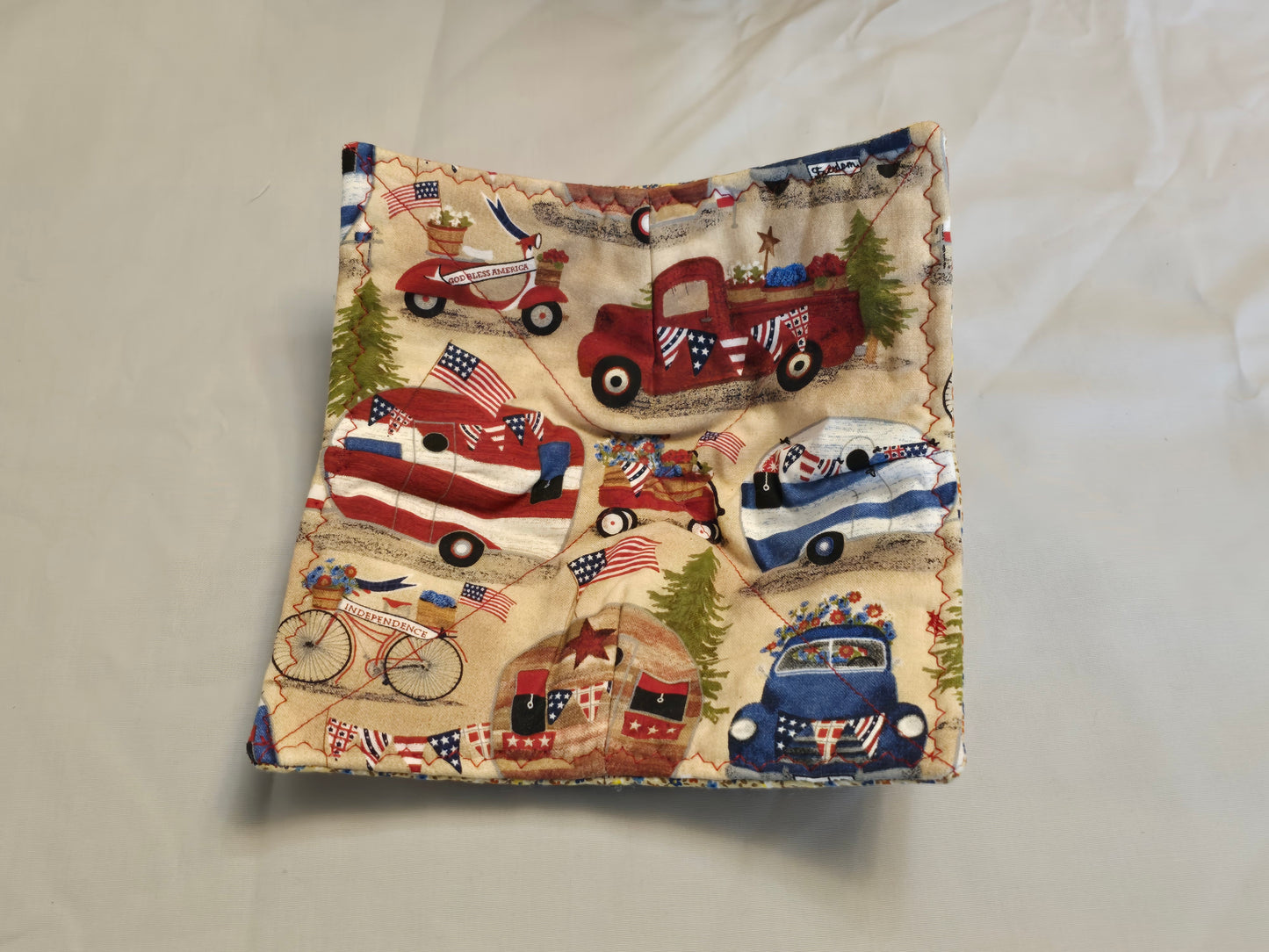 Plate Cozy-trucks on tan with blue floral