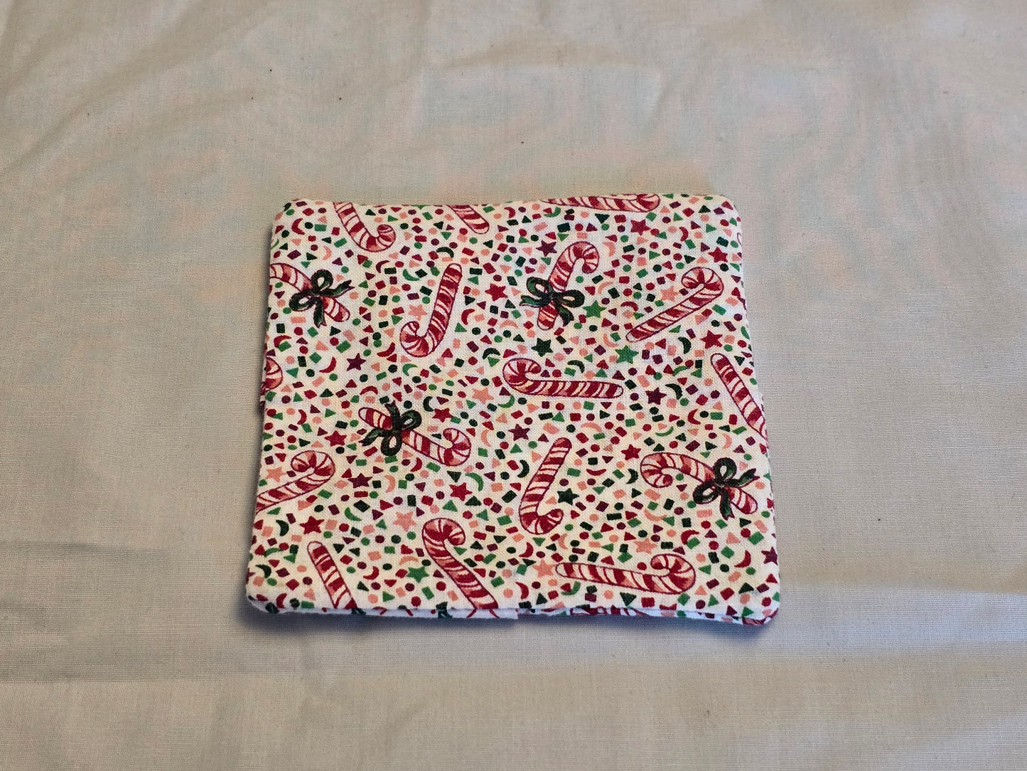 Coaster-candy canes and holly leaves