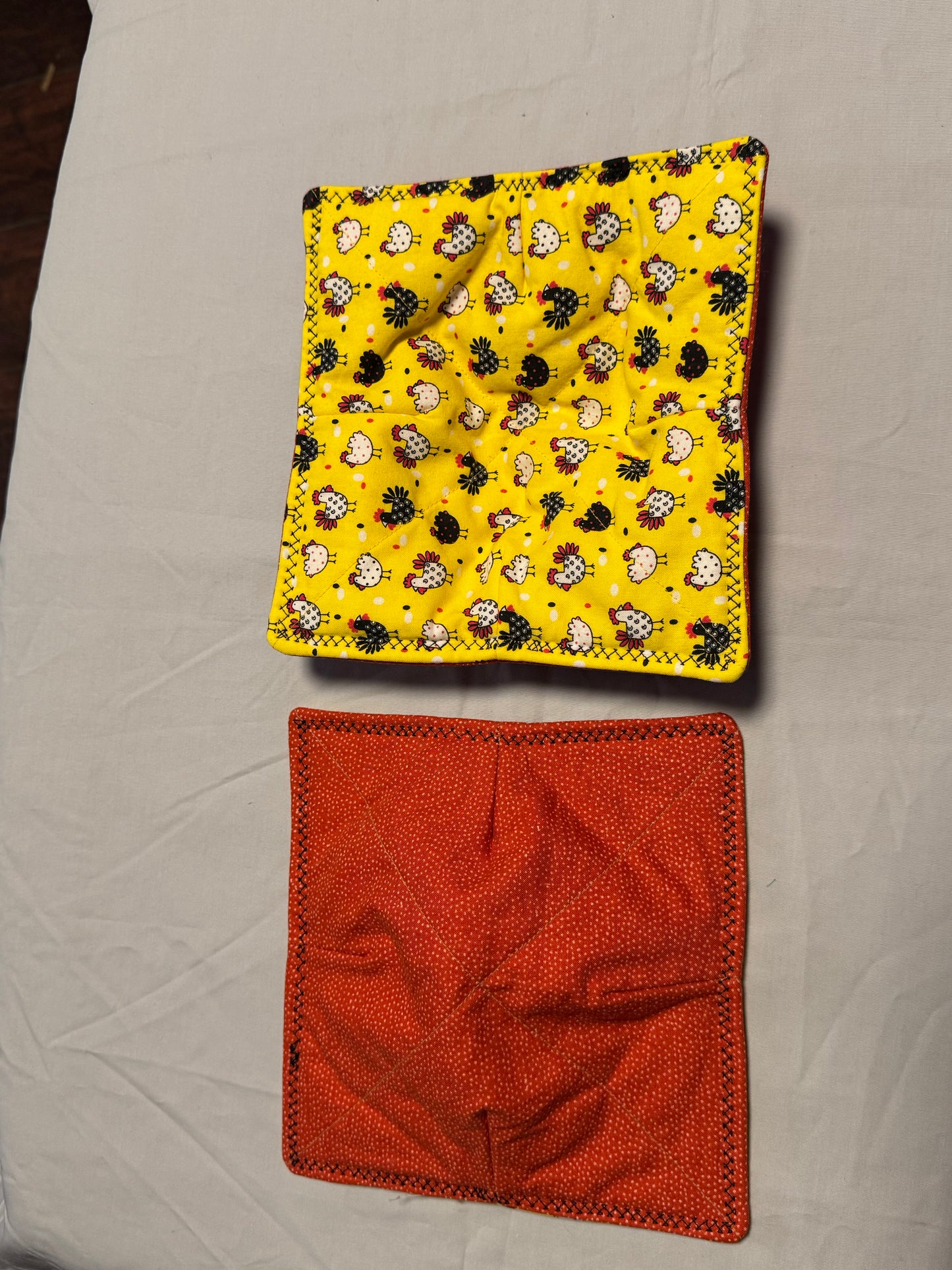 Plate cozy-black and white chickens/orange