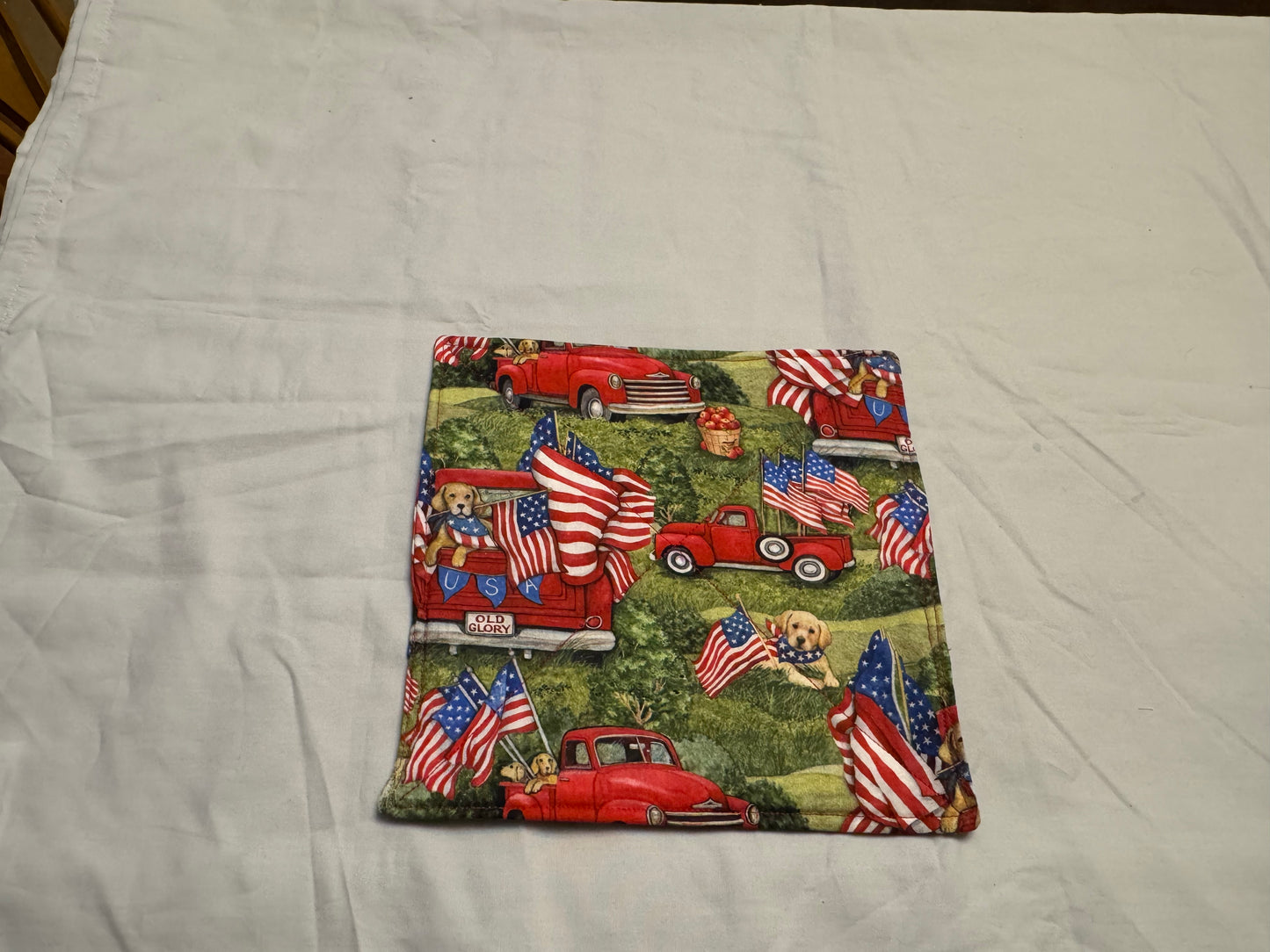 Pot holder 4th of July dogs with red truck