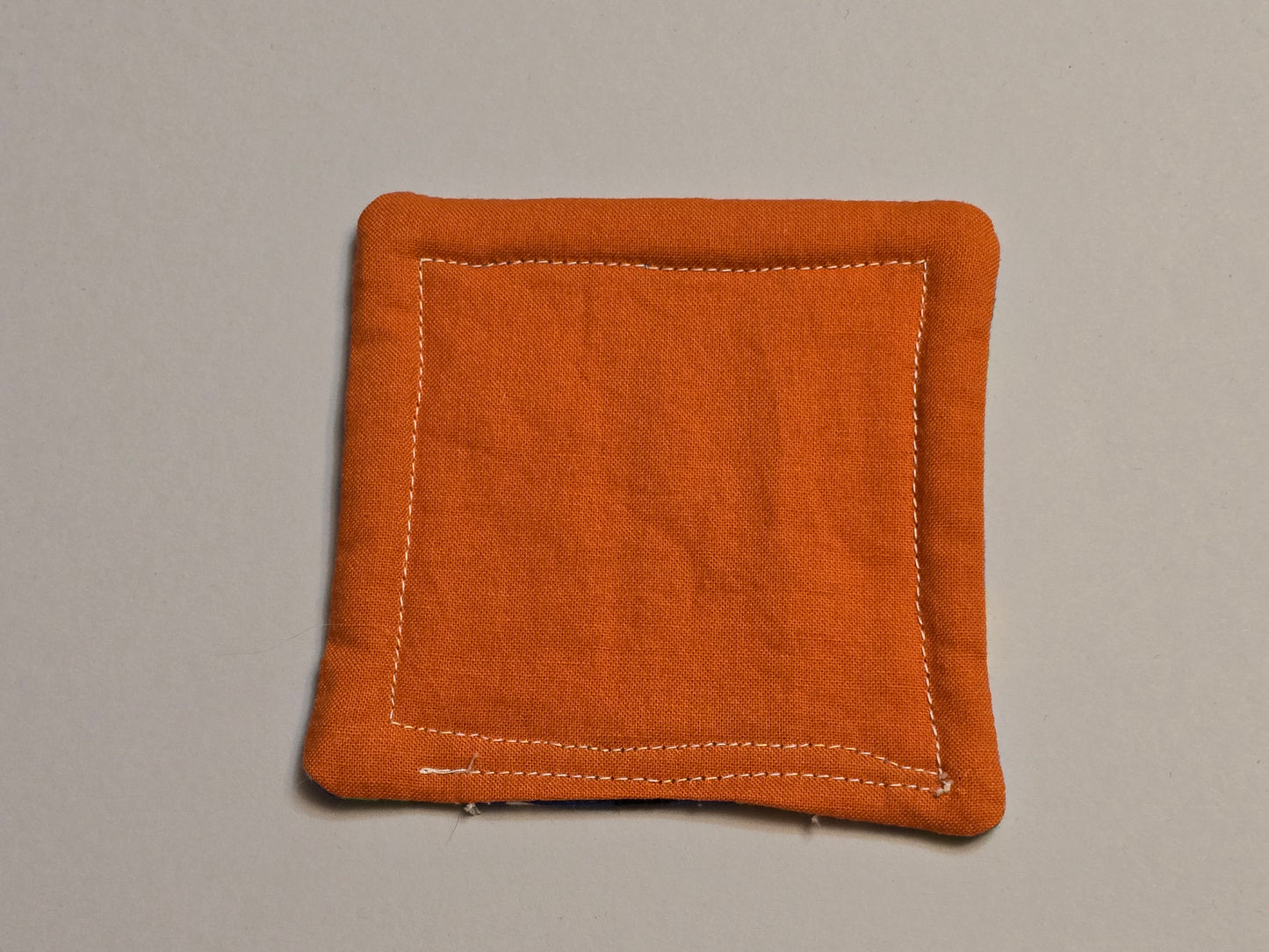 Coaster-Multi color paw print with orange